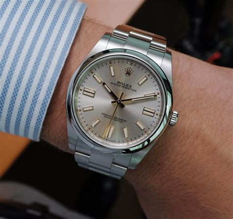 breitling watch.|Rolex Oyster Perpetual .